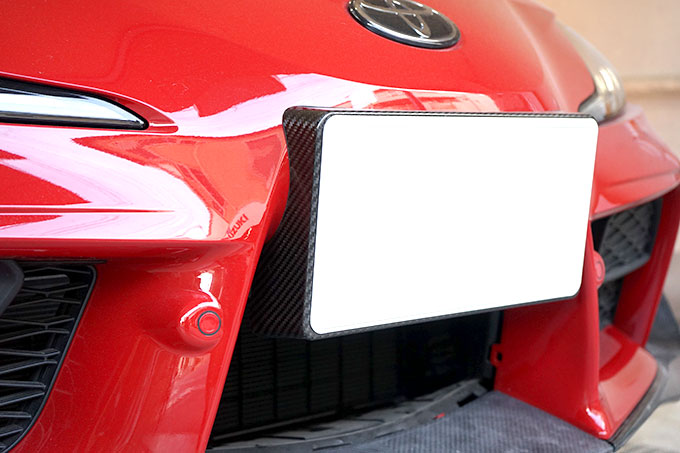 TOYOTA SUPRA 【Type:DB#2】Drycarbon license plate mount 1pcs/st596【for RHD】